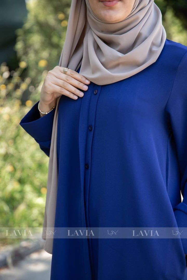 فستان نداء لون ازرق – الأناقة العملية بتفصيلة ذكية - Lavia